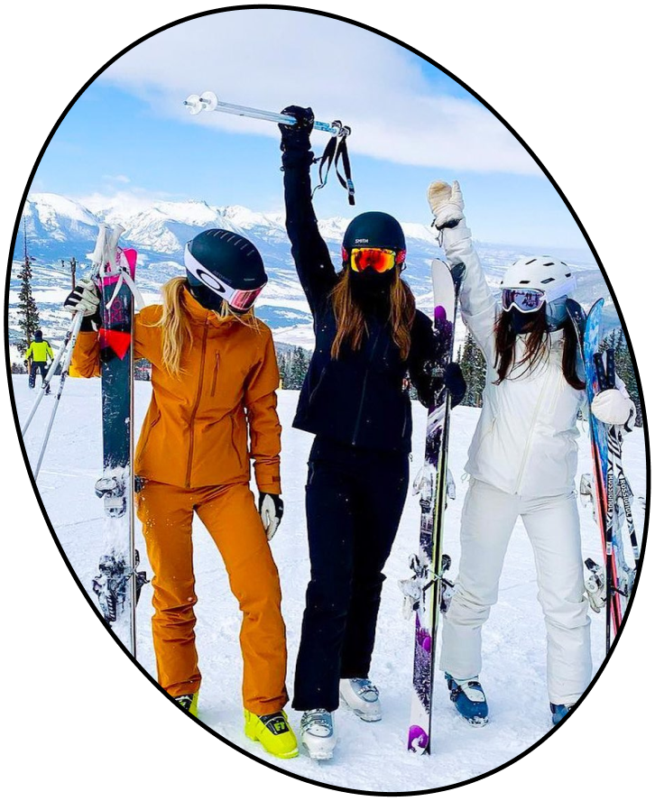 Three skiers dressed in Halfdays monochrome sets. 